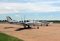 Airplane on landing strip.